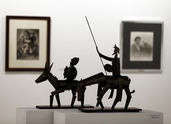 Don Quijote y Sancho cabalgan hacia otro hito